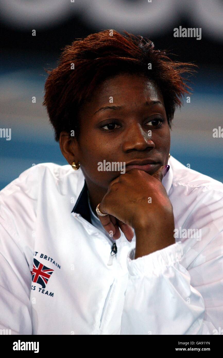 Great Britain's Ashia Hansen bides her time while waiting for her next jump in the triple jump competition Stock Photo