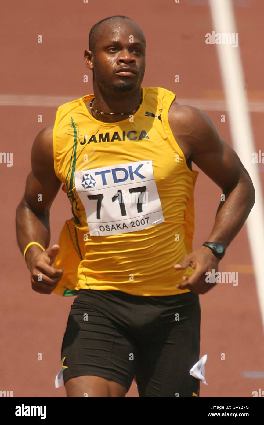 Jamaicas asafa powell in action in the 100 metre hi-res stock