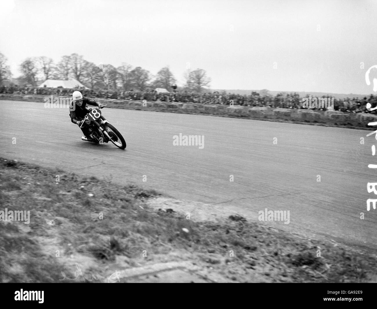 Motor Cycling, Silverstone. Geoff Duke in action on his Norton Stock Photo