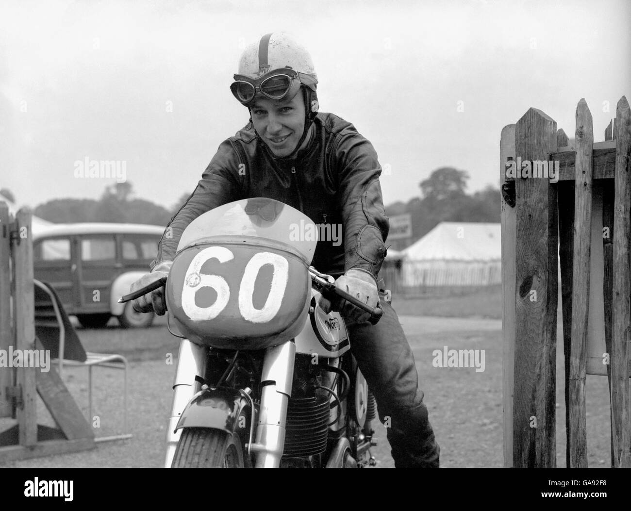 John Surtees on one of his own Norton bikes, which he raced independently at the Crystal Palace circuit, despite being contracted to ride for MV Augusta. He was to win in the 250cc, 350cc and 500cc classes and in each he broke the existing speed records. Stock Photo