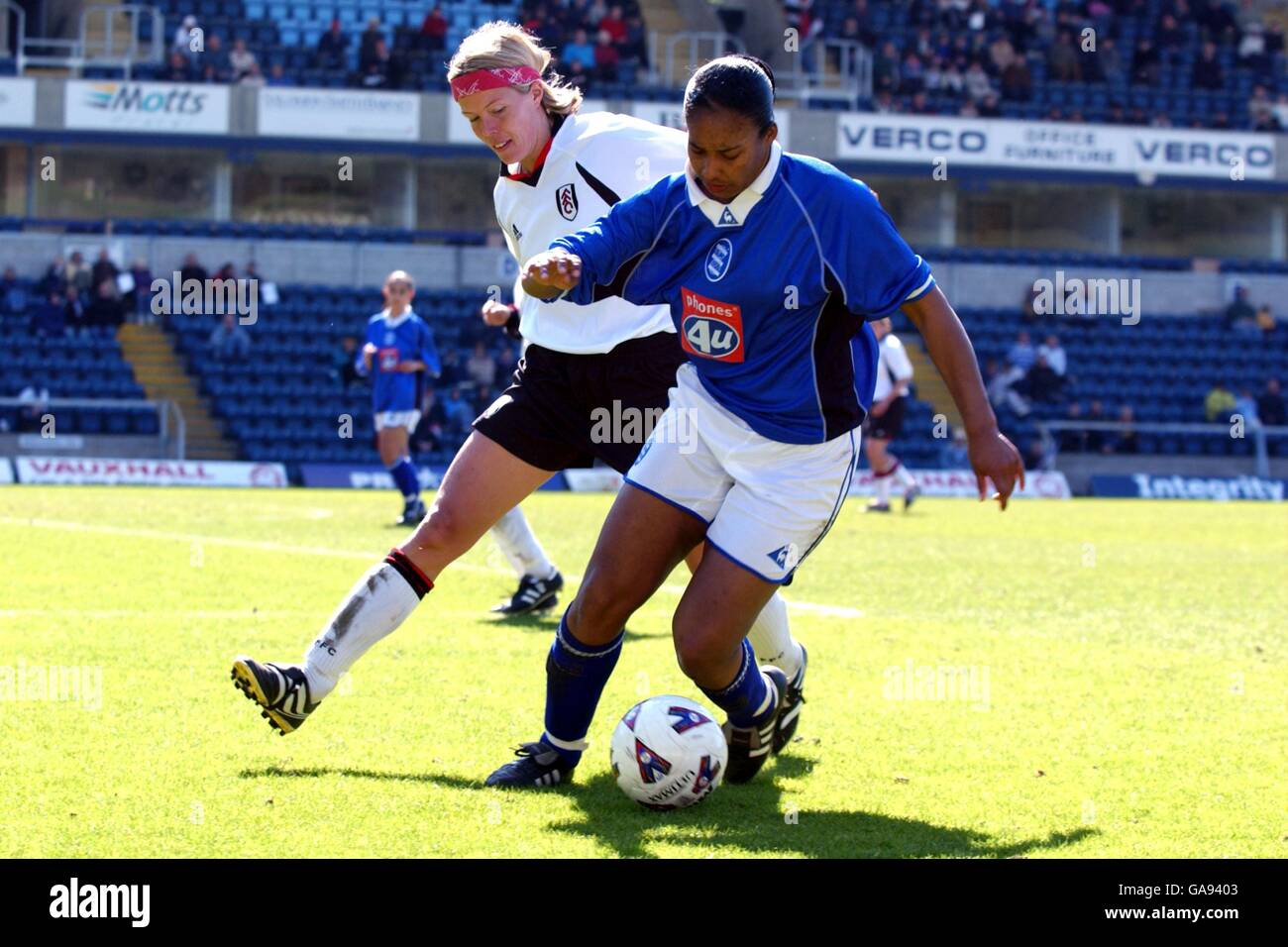 Birmingham City's Stephanie Samuels (r) is closed down by Fulham's Marianne Pettersen (l) Stock Photo