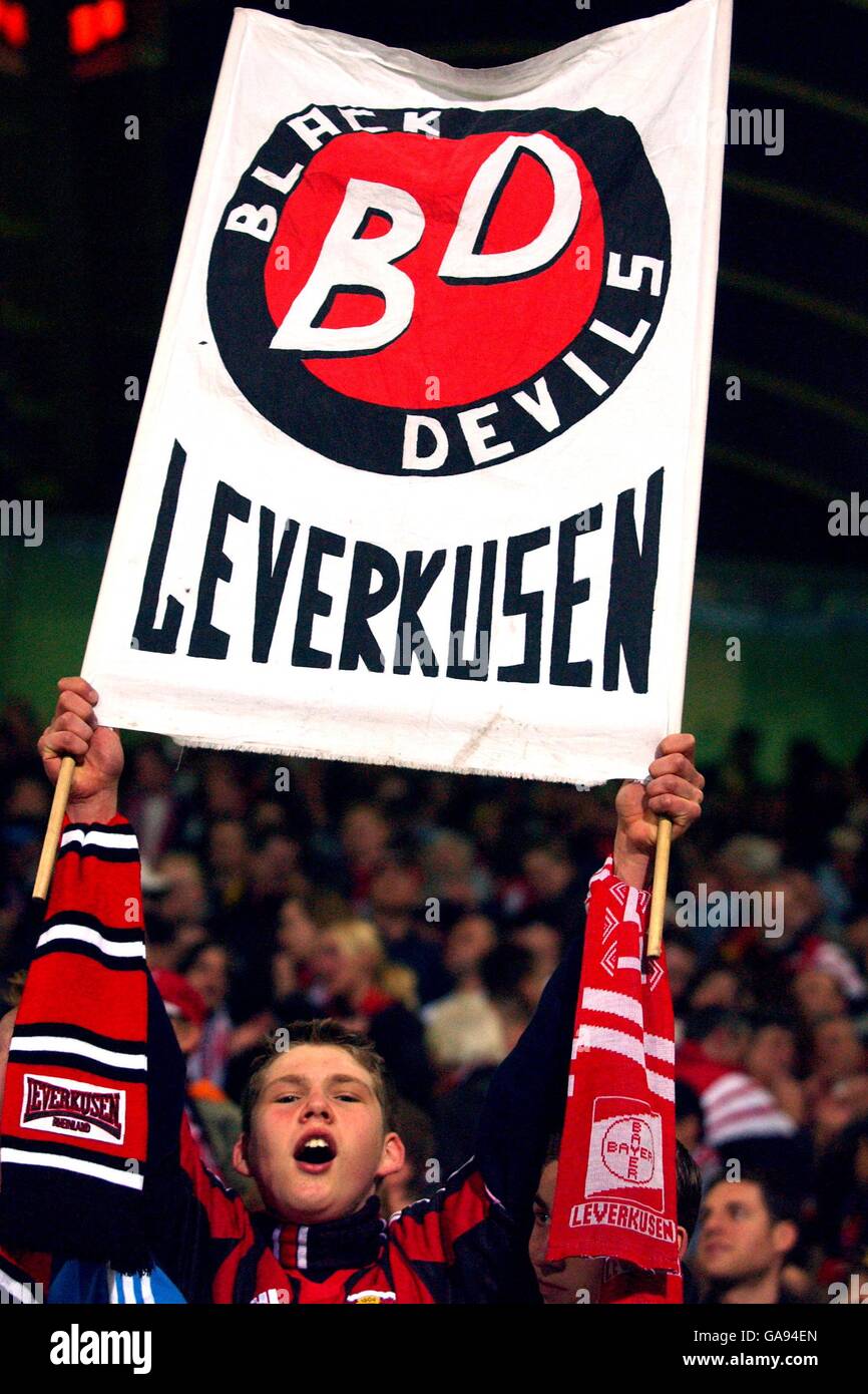 A bayer leverkusen fan celebrates at the final whistle hires stock