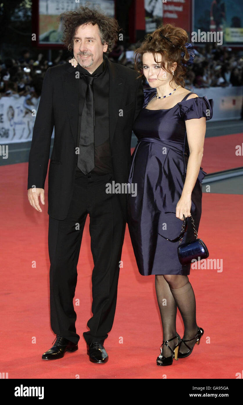 Director Tim Burton and wife Helena Bonham Carter arriving at the premiere for 'The Nightmare