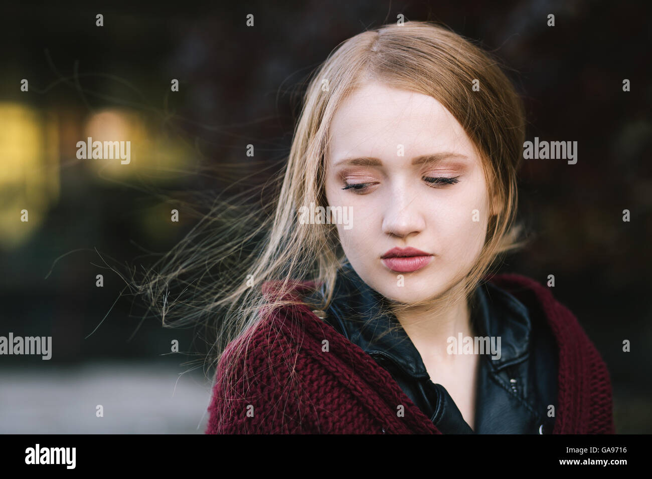 Portrait Of A Beautiful Girl Looking Down Stock Photo Alamy