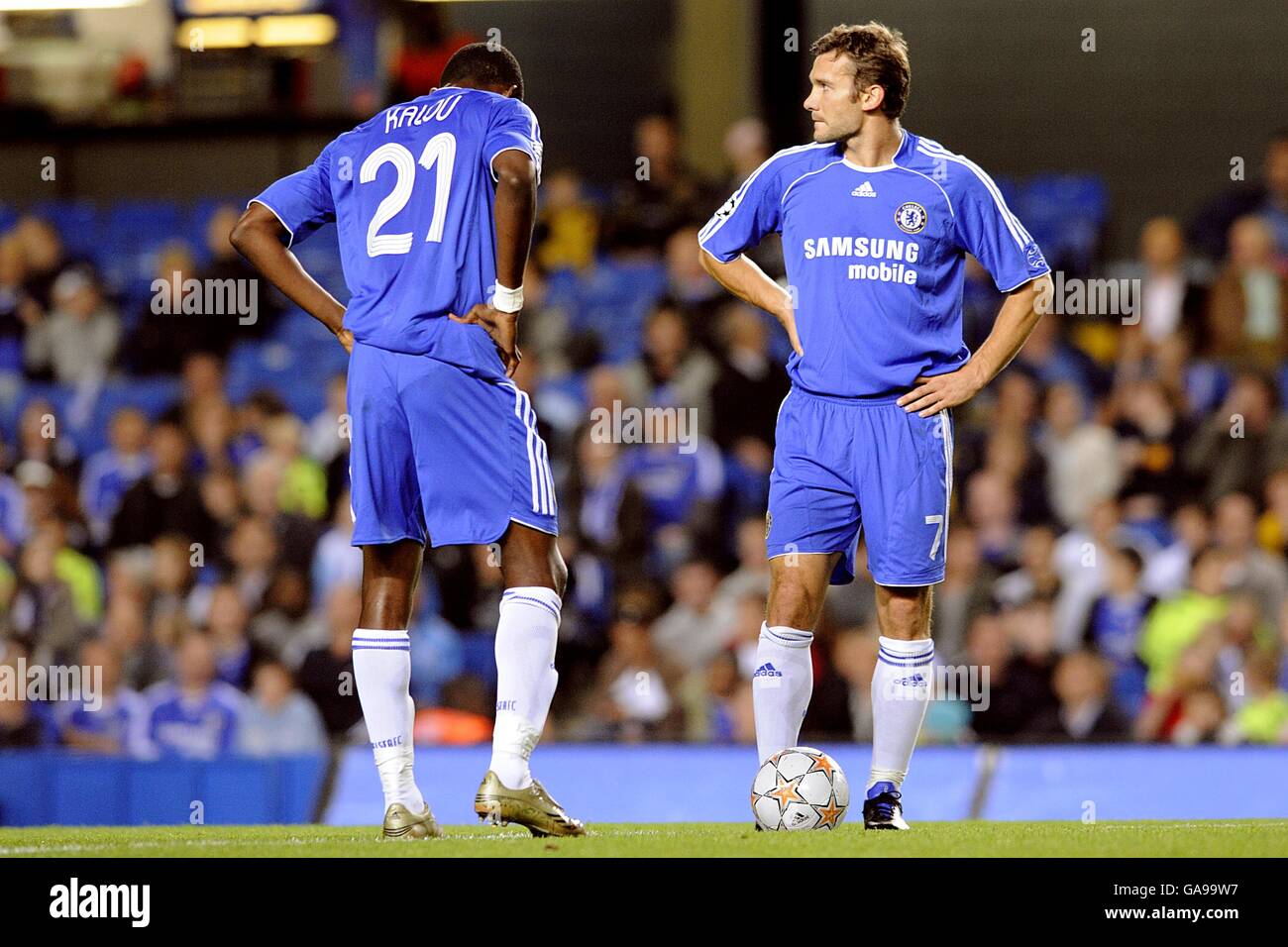Chelsea's Andriy Shevchenko (right) and Salomon Kalou stand dejected as they await the restart after Rosenborg's Miika Koppinen scores a shock early goal. Stock Photo
