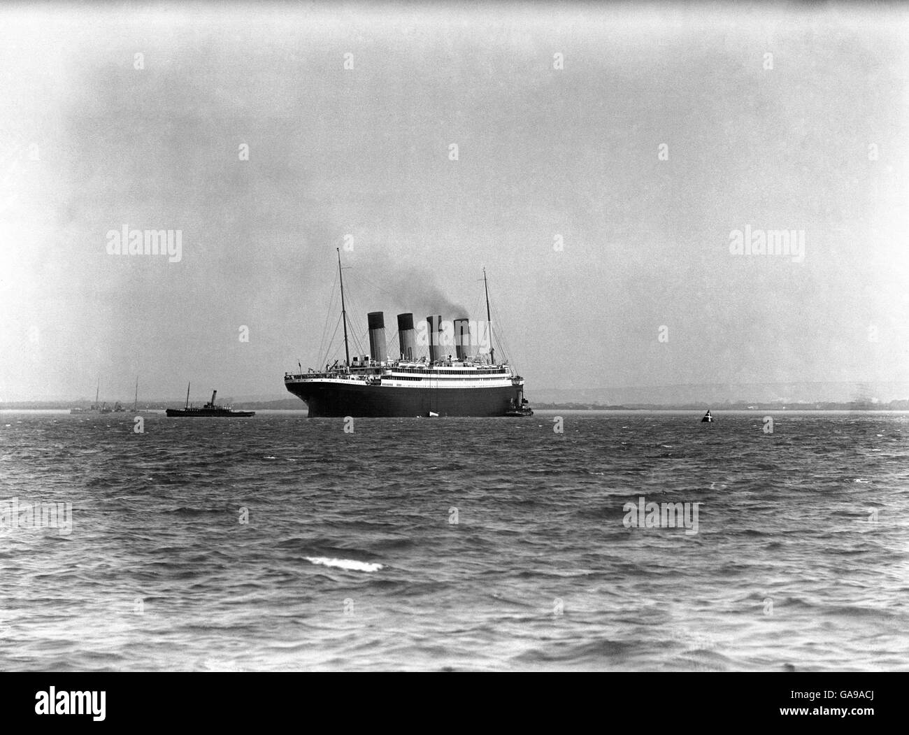 AFTERMATH OF TITANIC DISASTER. RMS Titanic's sister ship RMS Olympic off Spithead after the Titanic sank Stock Photo