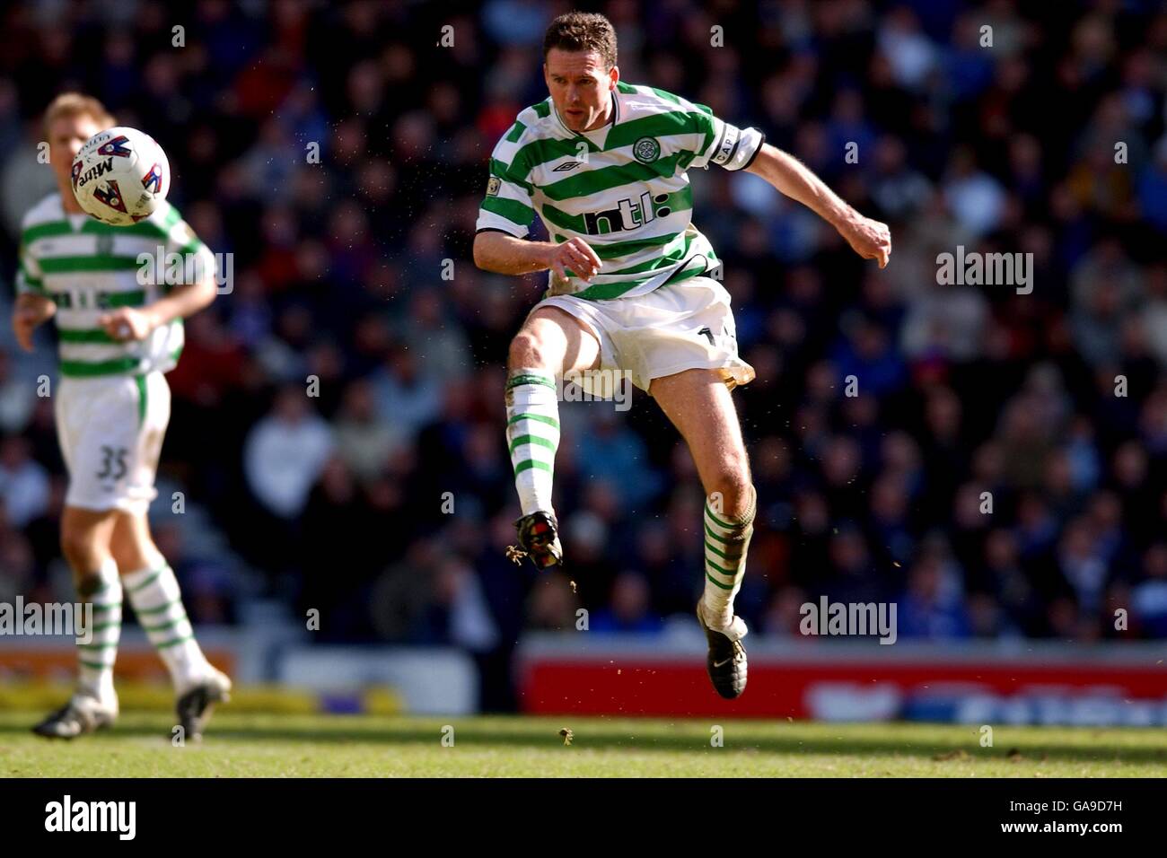 Scottish Soccer - Bank Of Scotland Premier League - Rangers v Celtic. Celtic's Paul Lambert volleys the ball forward Stock Photo