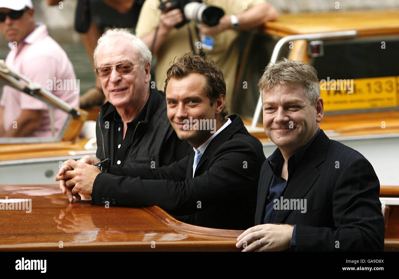 (From left to right) Sir Michael Caine, Jude Law, and Kenneth Branagh arrive by water taxi, for a photocall for their new film Sleuth, at the Venice Film Festival in Venice, Italy. Stock Photo