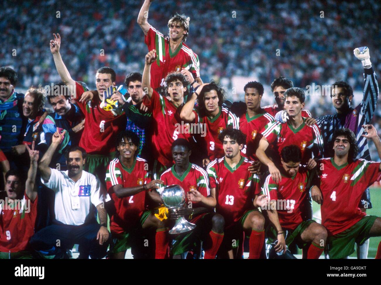 Portugal celebrate victory in the World Youth Cup Final, featuring Joao Pinto (top), Luis Figo (back row, no3) and Rui Costa (back row, no5) Stock Photo