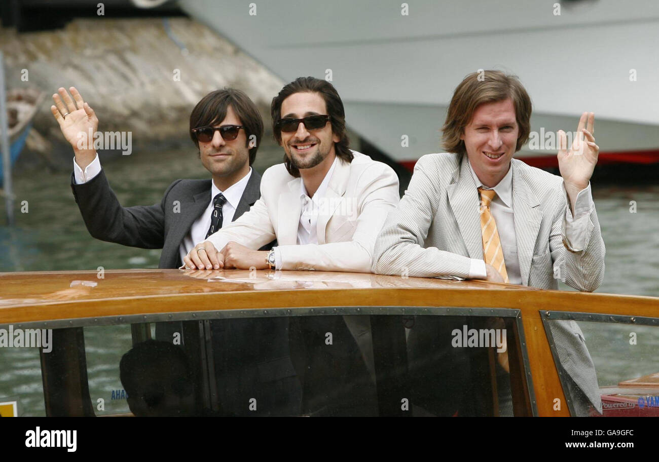 AP OUT Director Wes Anderson (right), Adrien Brody (centre) and co-writer Roman Coppola arrive by boat to attend a photocall for the film 'The Darjeeling Limited', at the Venice Film Festival in Italy PRESS ASSOCIATION Photo Picture date: Monday September 3, 2007. Photo credit should read: Yui Mok/PA Wire Stock Photo