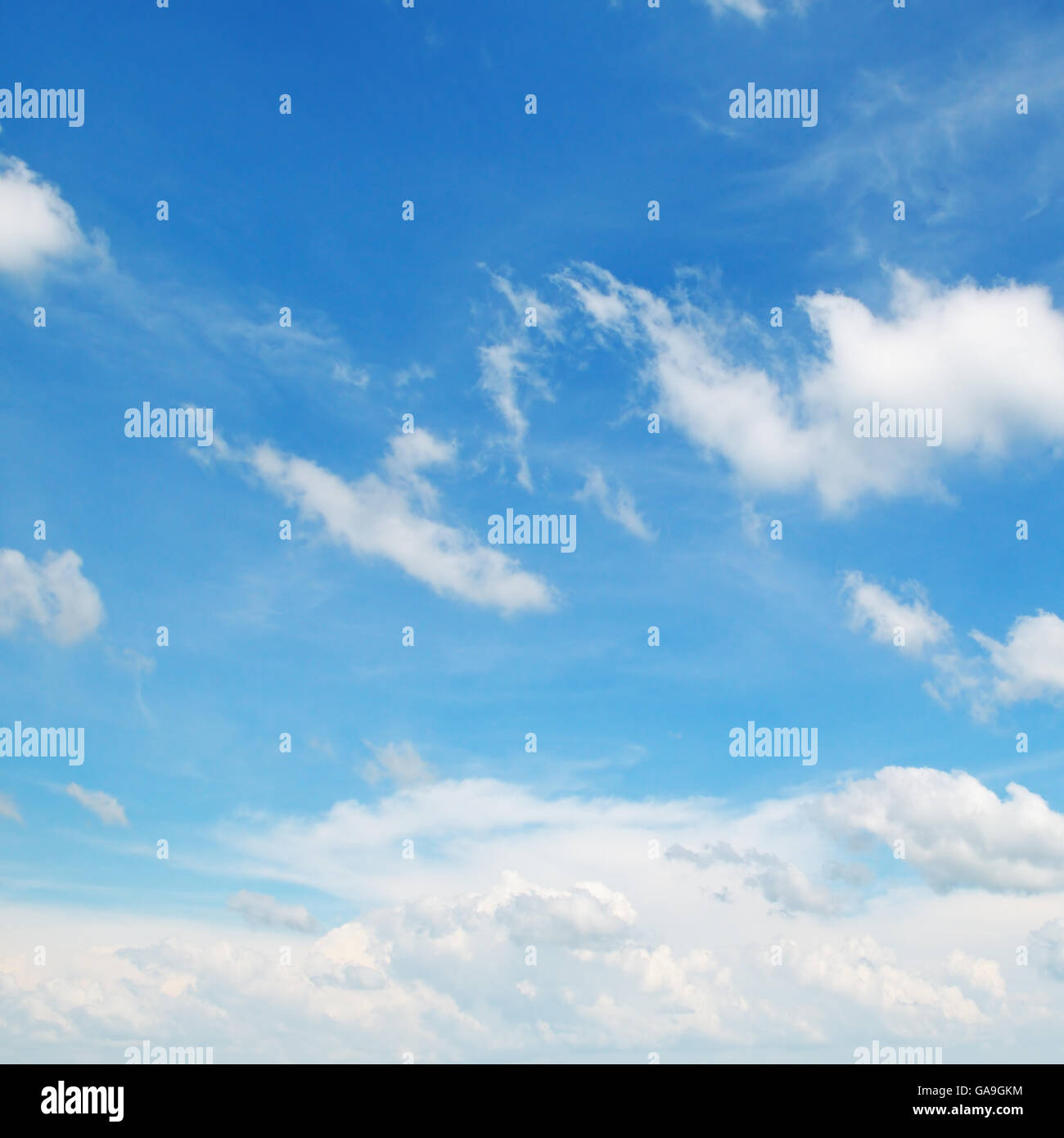 fluffy clouds in the blue sky Stock Photo - Alamy