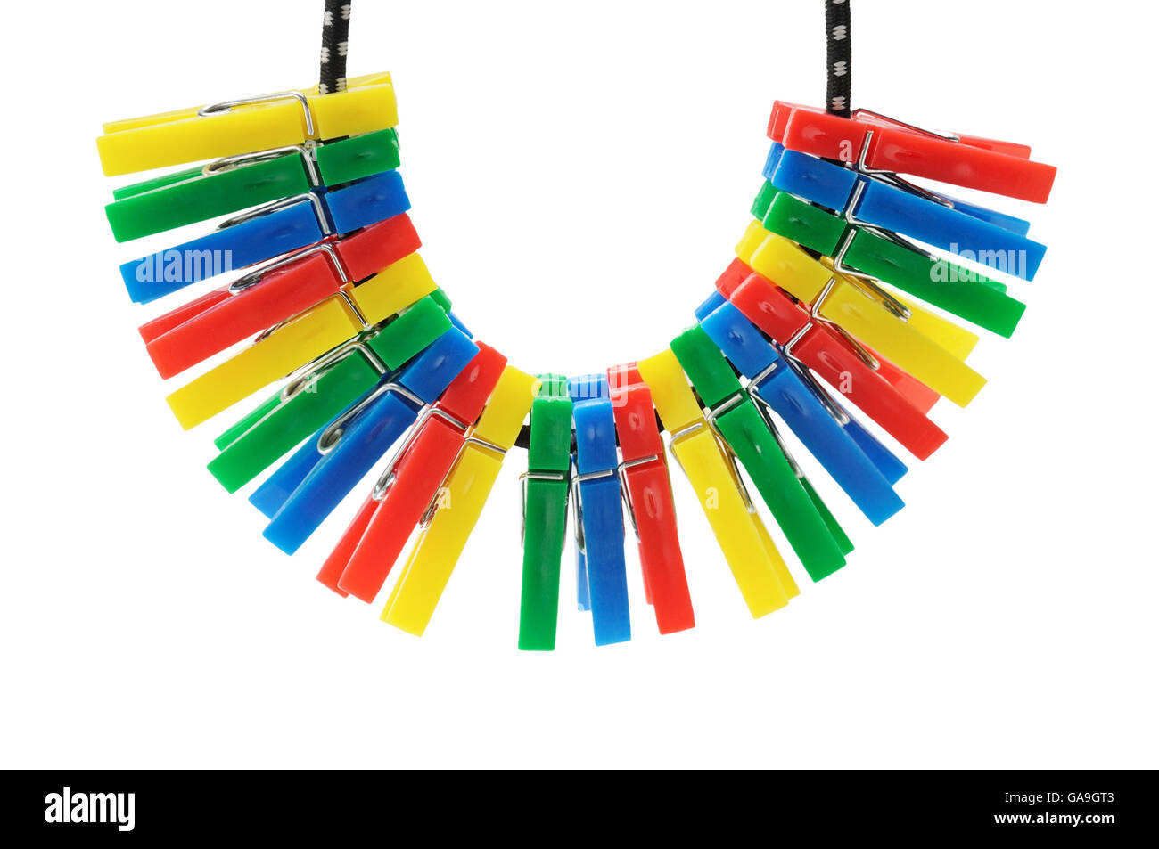 clothespins on a rope isolated on white background Stock Photo Alamy