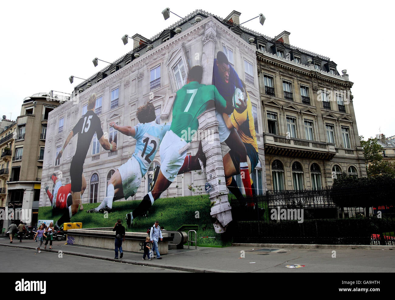 A building on the Avenue de la Grande Armee in Paris is covered in a mural of Serge Betson of France to promote the Rugby World Cup which starts in Paris tomorrow. Stock Photo