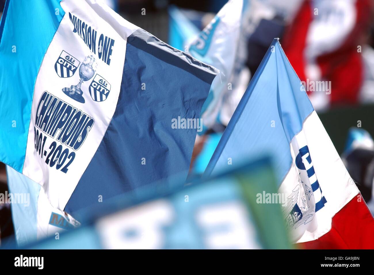 Soccer - Nationwide League Division One - Manchester City v Portsmouth. Manchester City fans fly their flags in celebration Stock Photo