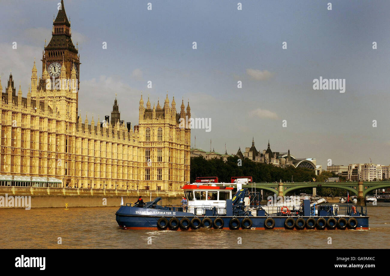 The new Thames Water Clearwater 2 makes its way upstream past the Houses of Parliament, where it is working to make the River Thames as clean as possible, this morning. Stock Photo