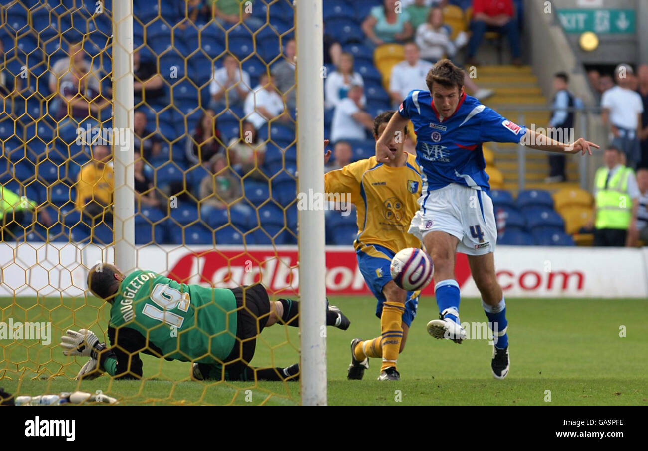 Chesterfield's Jamie Lowry scores the second goal during the Coca-Cola Football League Two match at Field Mill, Mansfield. Stock Photo