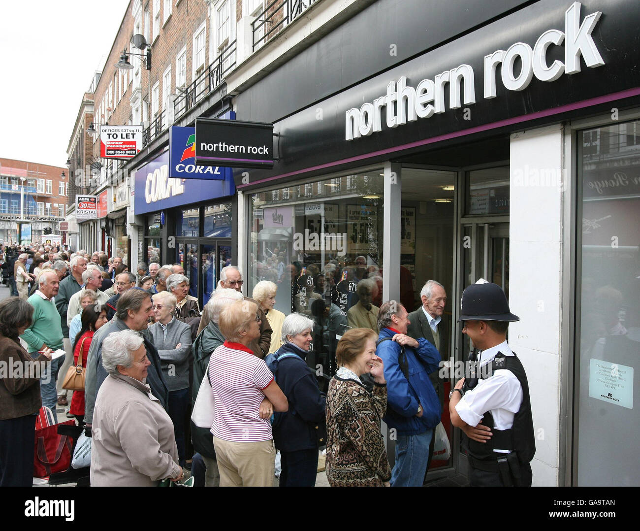 Customers queuing outside a Northern Rock branch in Kingston upon