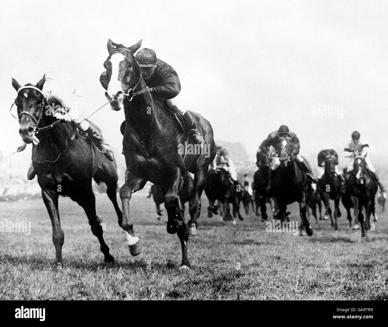 Horse Racing - The Derby Stakes - Epsom - 1921. 'Humorist', second left, Steve Donoghue up, comes home to win The Derby. Stock Photo