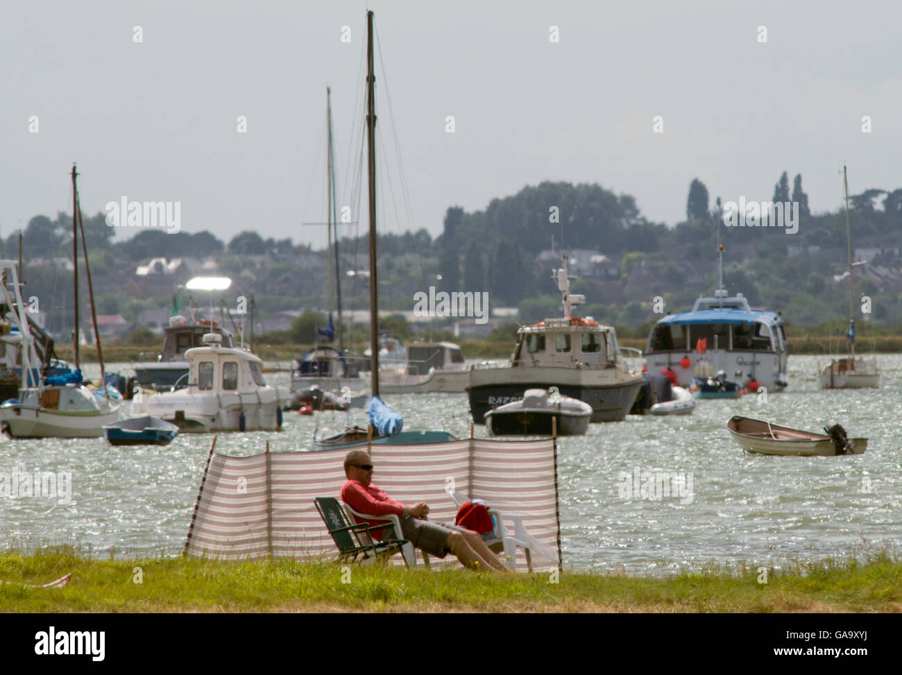 West Mersea, Essex, UK. 4th August, 2016. UK Weather A man enjoys a