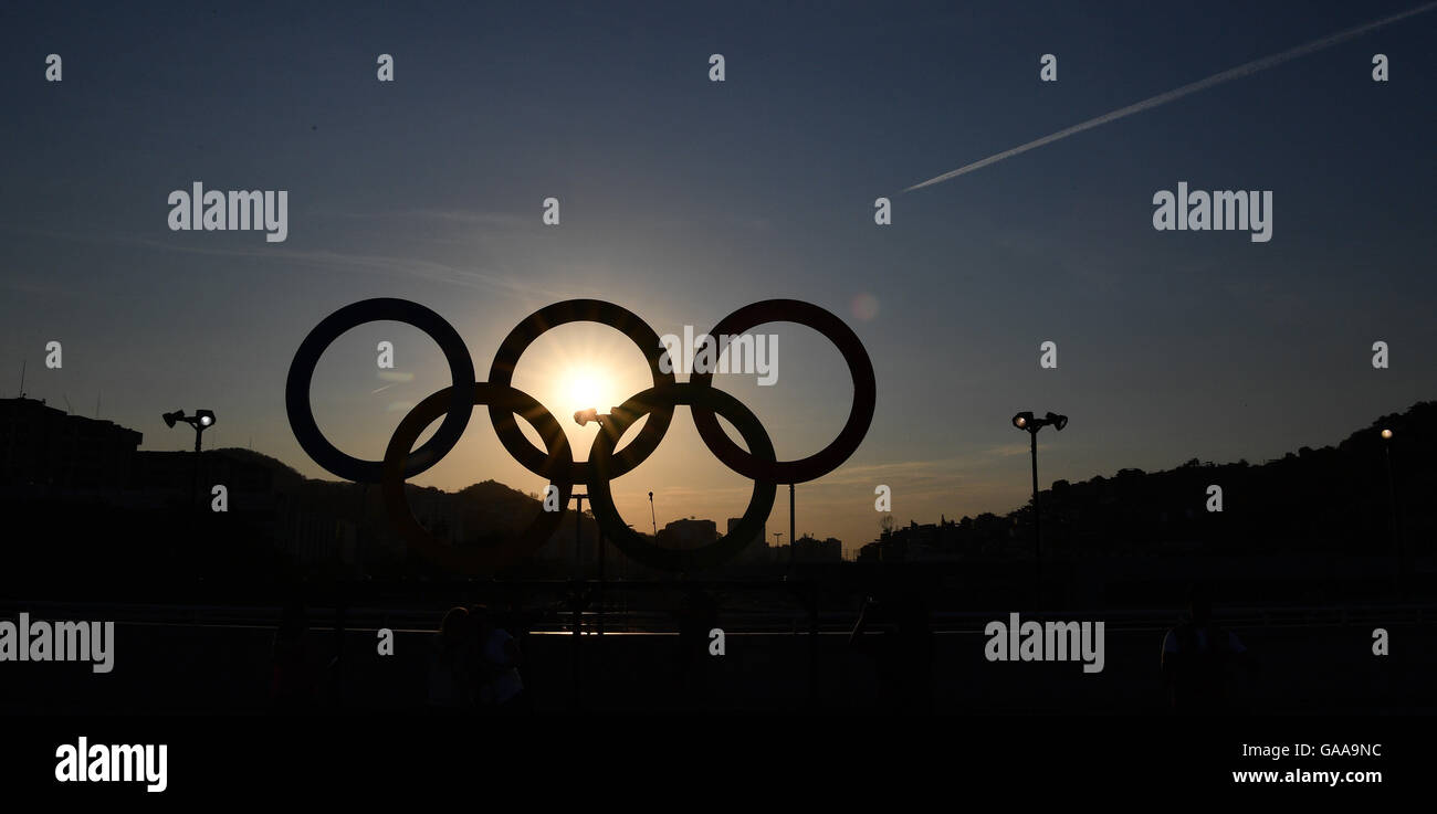 The Olympic Rings are backlit by the sun prior to the opening ceremony ...