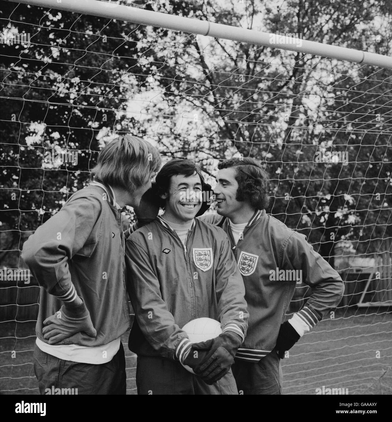 England goalkeepers Phil Parkes (l) and Peter Shilton (r) have a quiet word with incumbent Gordon Banks (c) Stock Photo