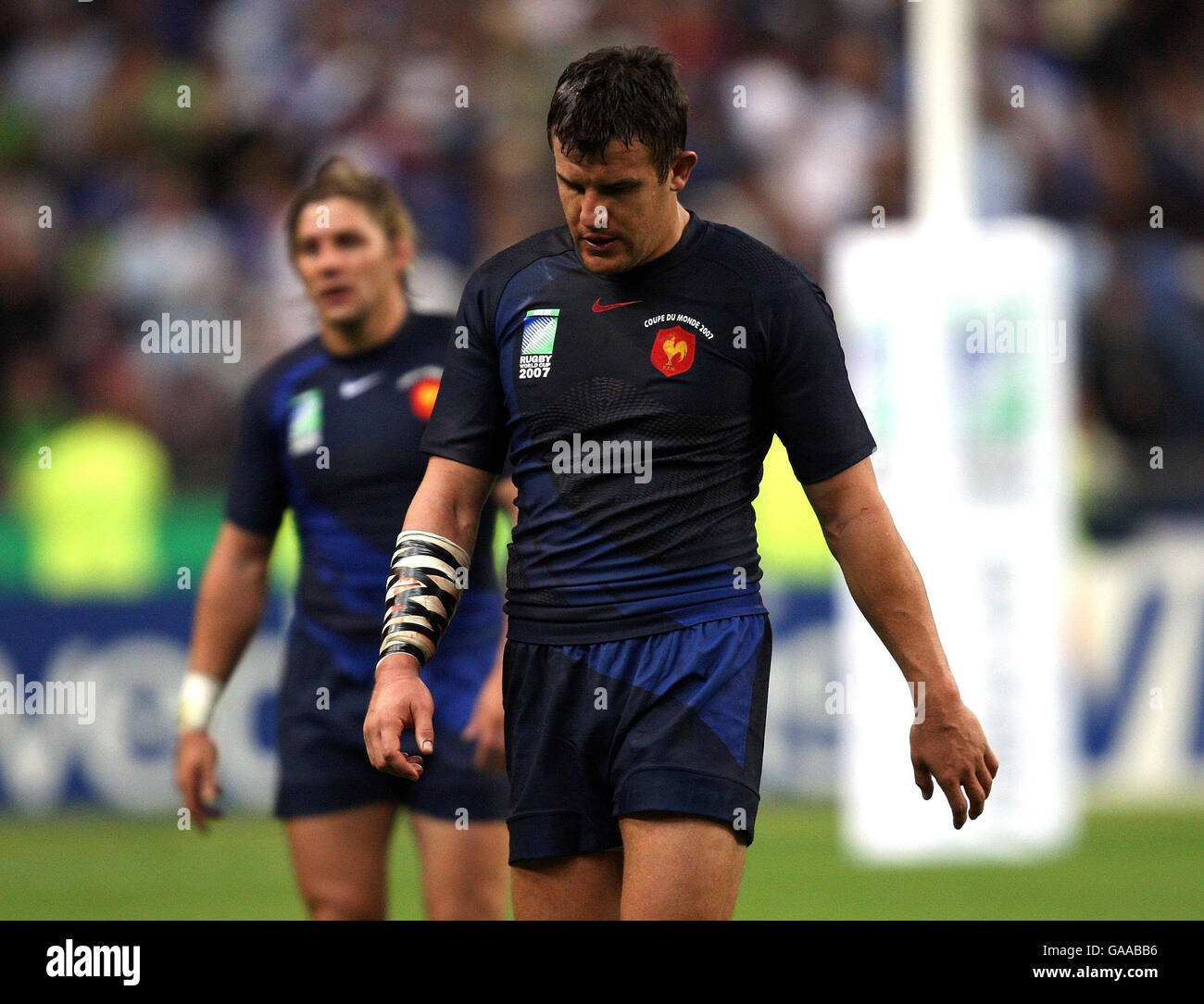 France's Damien Traille makes his way off after defeat to Argentina