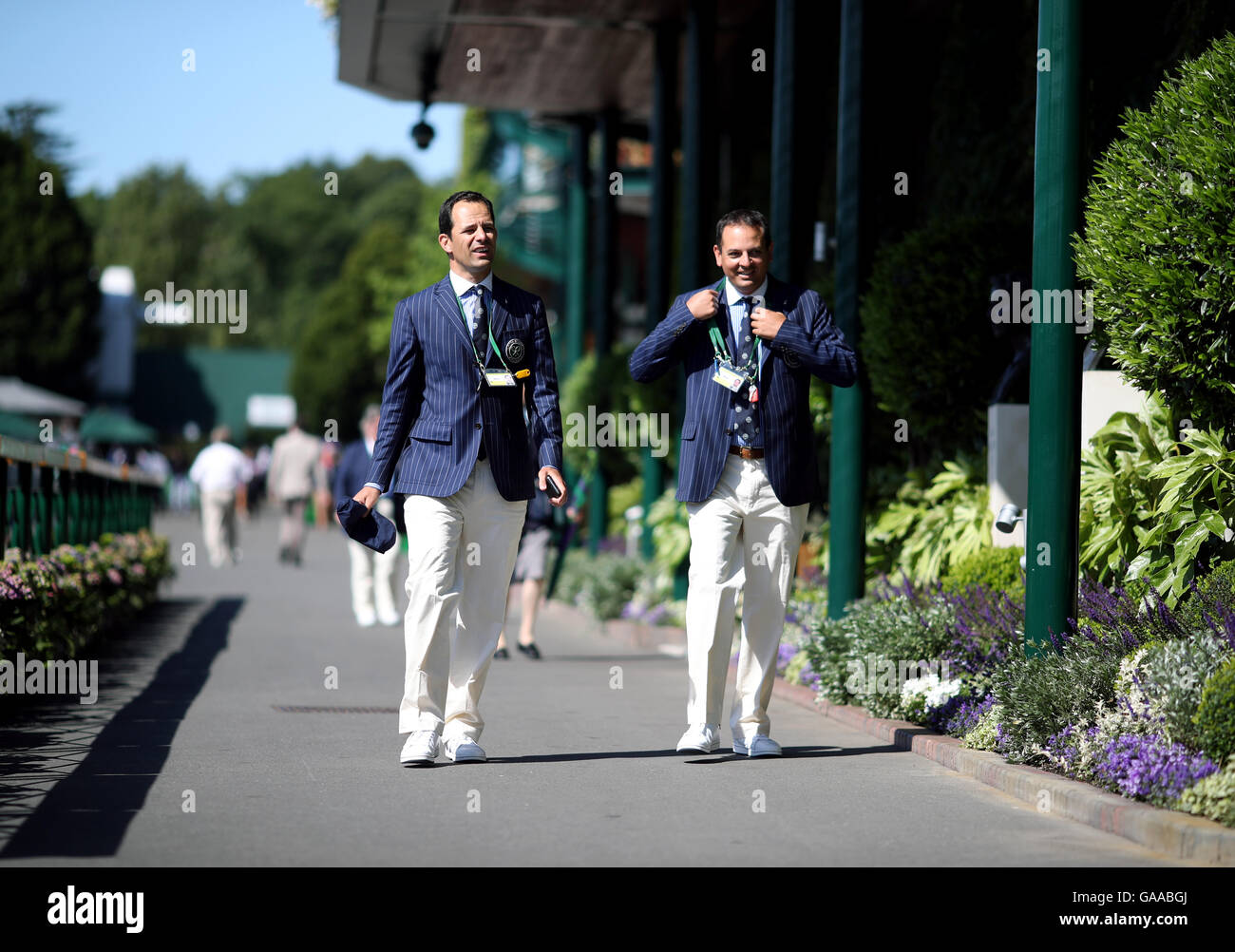 Line judges arrive on day seven of the Wimbledon Championships at the