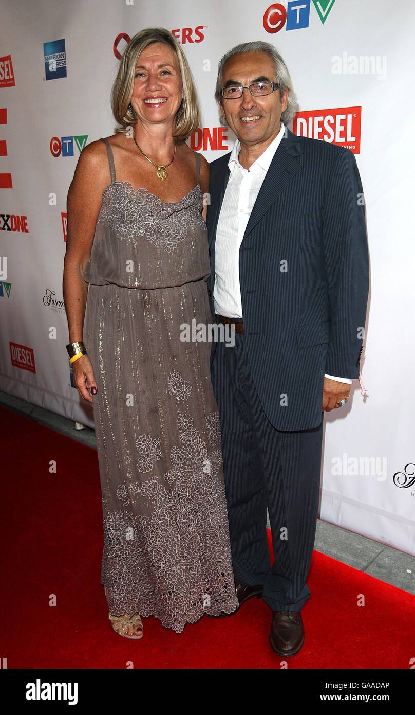 Phil Fontaine (right) arrives for the OneXOne Benefit Gala, honouring humanitarian efforts, at