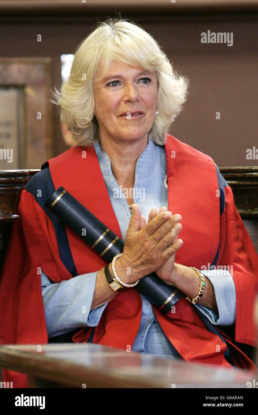 Britain Duchess of Cornwall reacts as she listens to a speech after being awarded with an Honorary Fellowship of King's College London. Stock Photo