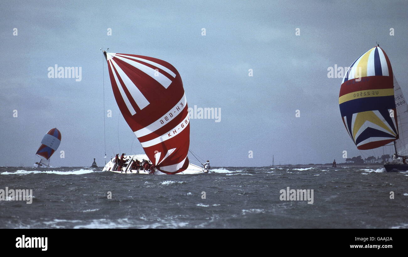 AJAXNETPHOTO. AUGUST, 1979. SOLENT, ENGLAND. - ADMIRAL'S CUPPER DEATH ROLL -  3 - HONG KONG ENTRY VANGUARD PERFORMS A CLASSIC BROACH AND WIPE OUT IN THE GALE FORCE WINDS THAT HIT THE FLEET DURING THE 2ND INSHORE RACE IN THE SOLENT. (THIS IS NR. 3 IN A SERIES OF 5 PICTURES; SEARCH ALAMY KEYWORD - VANGUARD). PHOTO:JONATHAN EASTLAND/AJAX  REF:906091 36 1 Stock Photo