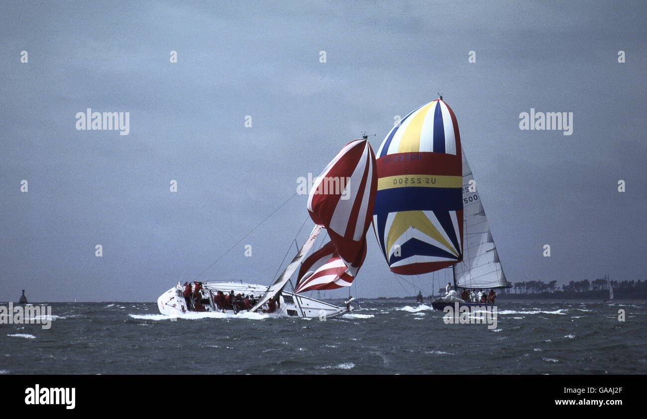 AJAXNETPHOTO. AUGUST, 1979. SOLENT, ENGLAND. - ADMIRAL'S CUPPER DEATH ROLL -  5 - HONG KONG ENTRY VANGUARD PERFORMS A CLASSIC BROACH AND WIPE OUT IN THE GALE FORCE WINDS THAT HIT THE FLEET DURING THE 2ND INSHORE RACE IN THE SOLENT.(THIS IS NR. 5 IN A SERIES OF 5 PICTURES; SEARCH ALAMY KEYWORD - VANGUARD). PHOTO:JONATHAN EASTLAND/AJAX  REF:906091 36 1 Stock Photo