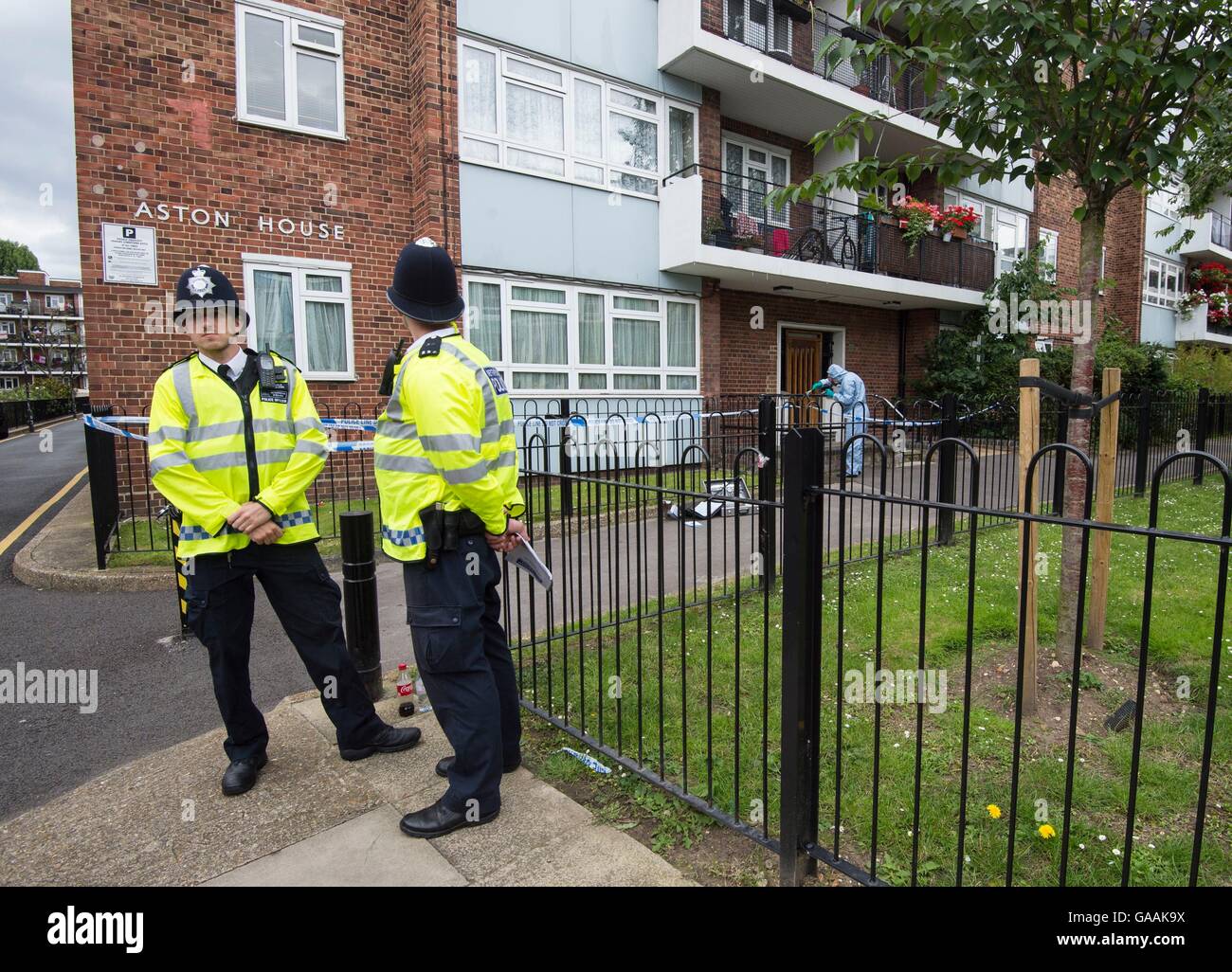 A forensic officer at Aston House in Portobello Court, London close to where a 16yearold was