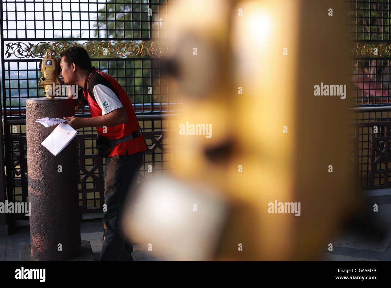 Kuala Selangor, Malaysia. 04th July, 2016. An officer from Malaysian Islamic installs a telescope to sight the new moon crescent at the peak of Bukit Malawati. © Ady Abd Ropha/Pacific Press/Alamy Live News Stock Photo