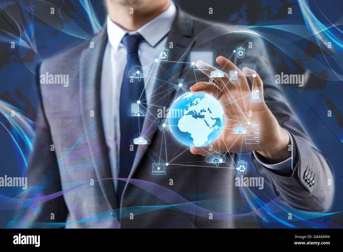 Businessman holding earth in global concept Stock Photo - Alamy
