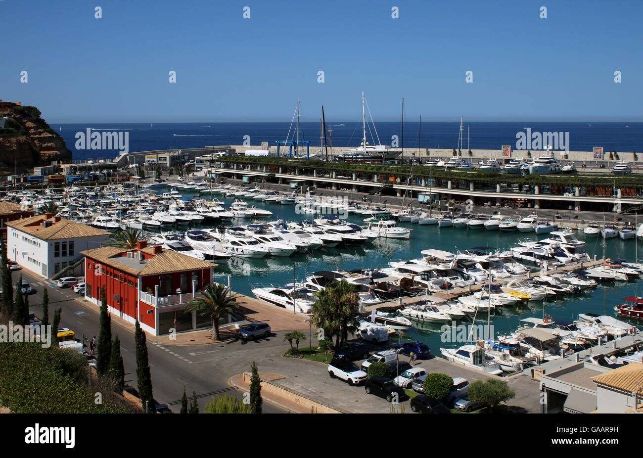 View over Port Adriano marina - original marina in the foreground and Philippe Starck designed superyacht marina Stock Photo