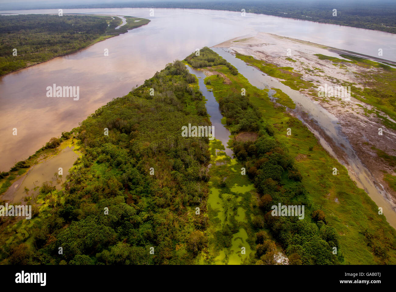 Aerial view of Amazon River, with settlements and secondary rainforest ...