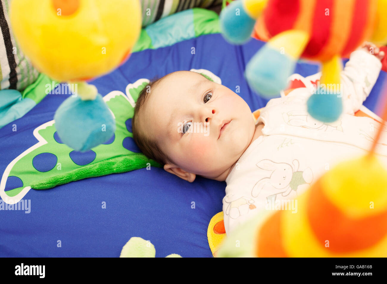 Baby on activity mat Stock Photo Alamy