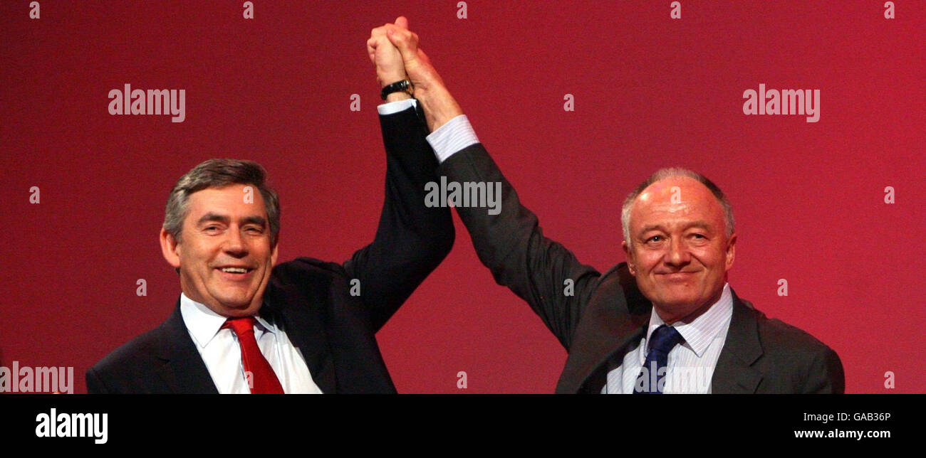 London Mayor Ken Livingstone raises Prime Minister Gordon Brown's hand during the Labour Party Conference in Bournemouth. Stock Photo