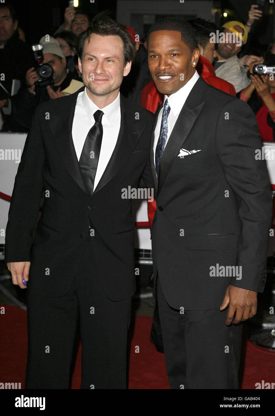 Christian Slater and Jamie Foxx arrive for The National Movie Awards at the Royal Festival Hall, central London. Stock Photo