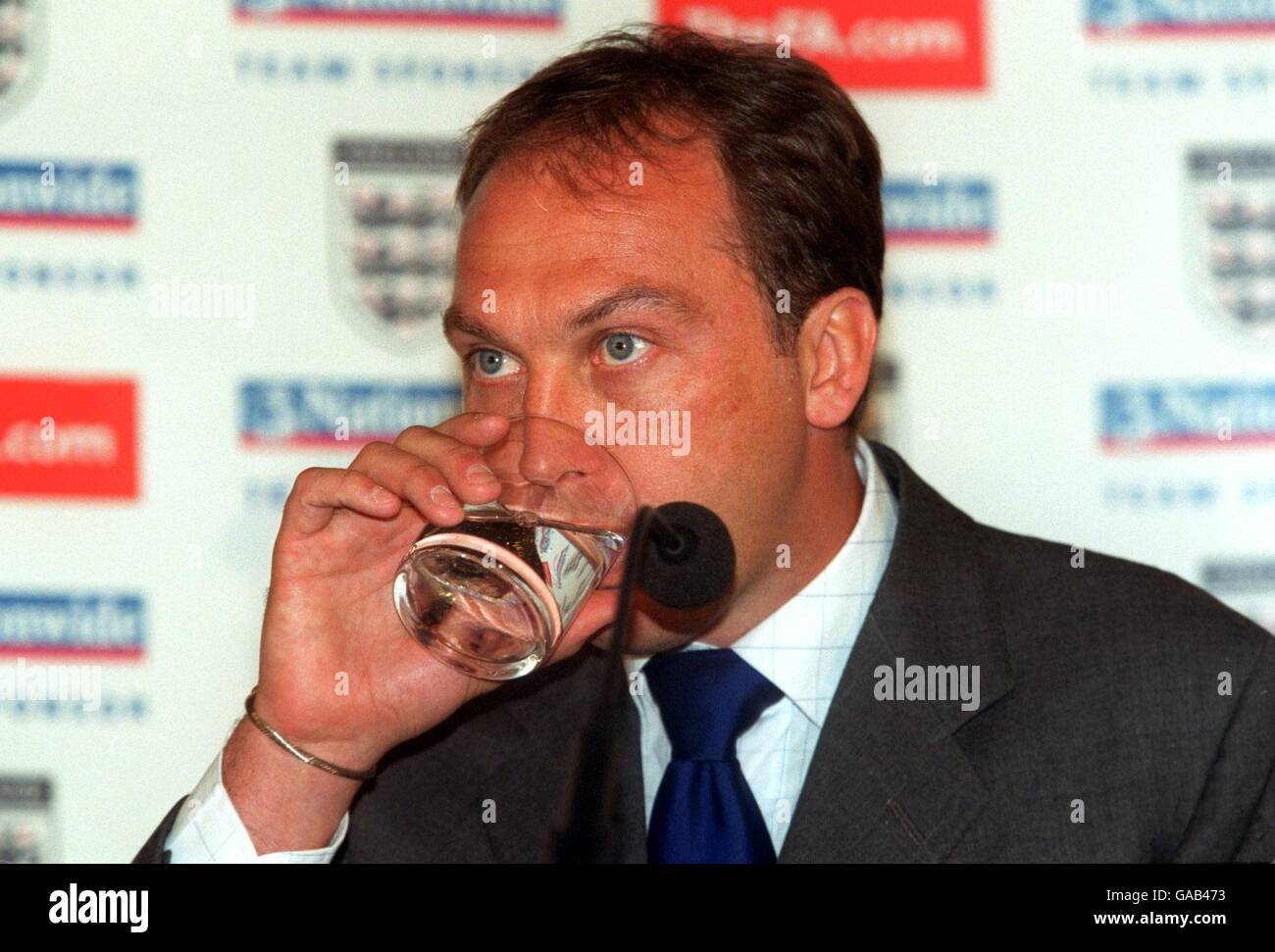Soccer - England Press Conference - England's World Cup Squad Announcement. England Under 21 Manager David Platt has a sip of water Stock Photo