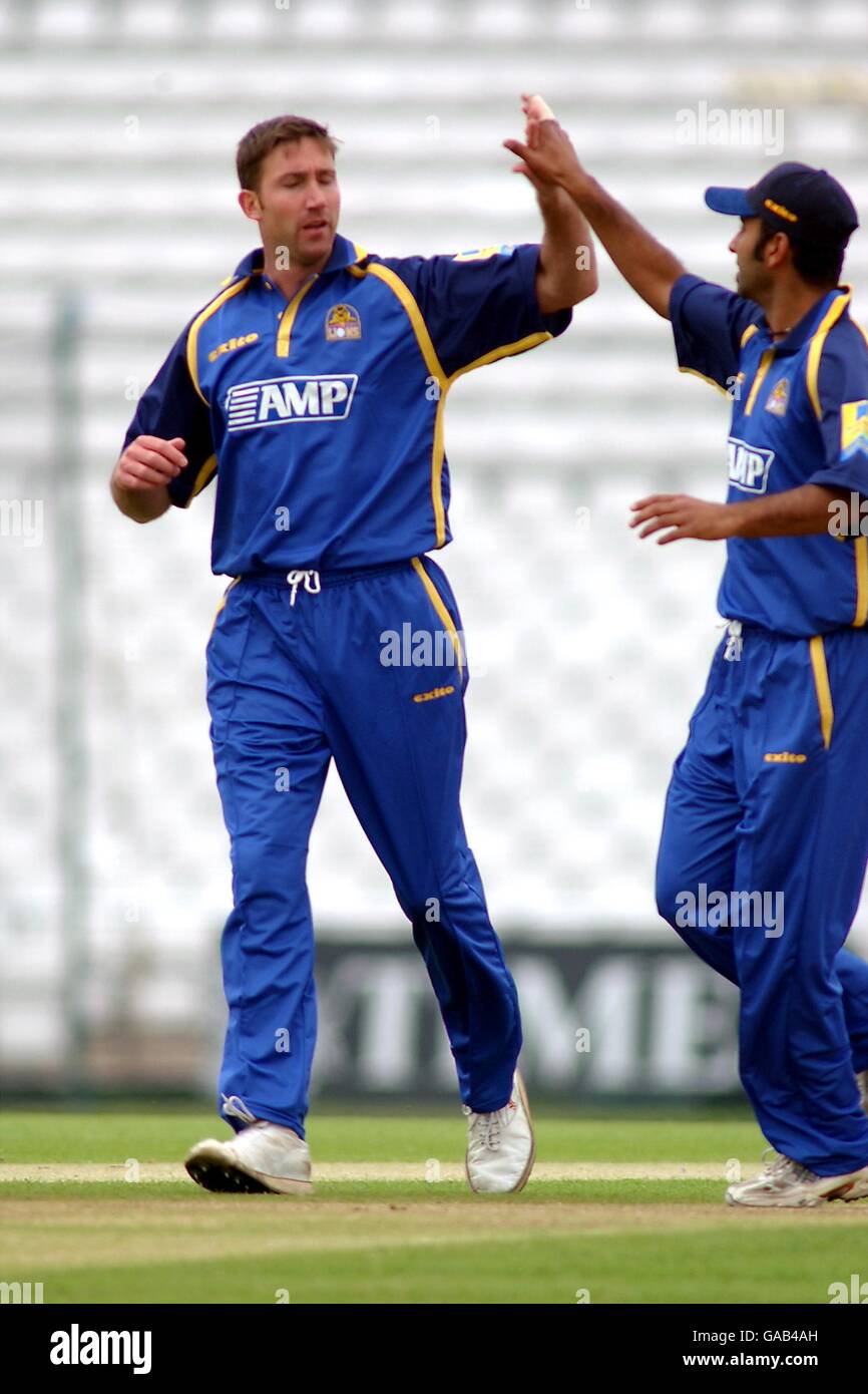 (L-R) Surrey's Ian Salisbury and Nadeem Shahid celebrates a wicket. Stock Photo