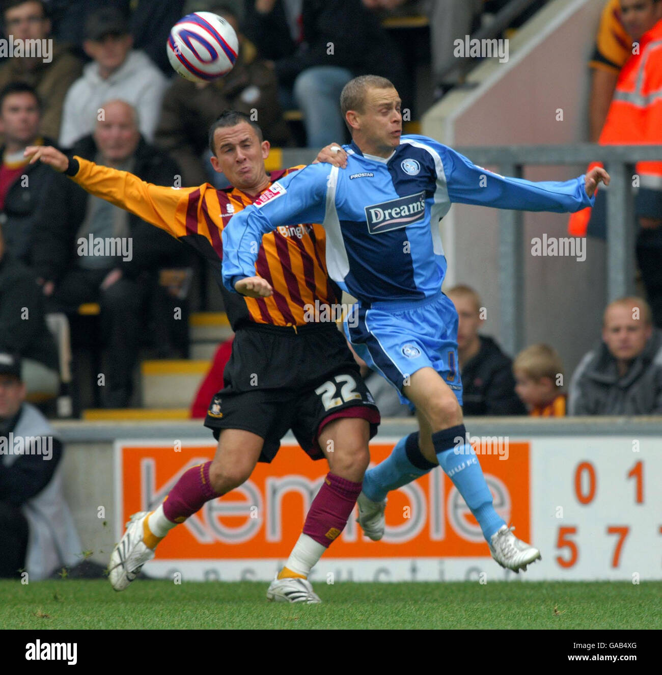 Bradford's Kyle Nix and Wycombe's Martin Bullock battle for the ball during the Coca-Cola Football League Two match at Valley Parade Stadium, Bradford. Stock Photo