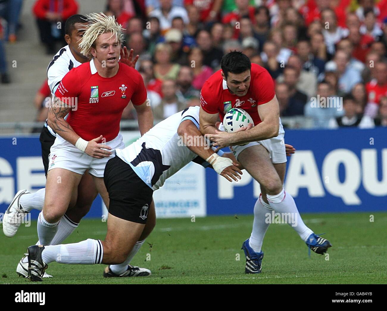 Wales Stephen Jones Races Past The Fiji Defence Hi-res Stock ...