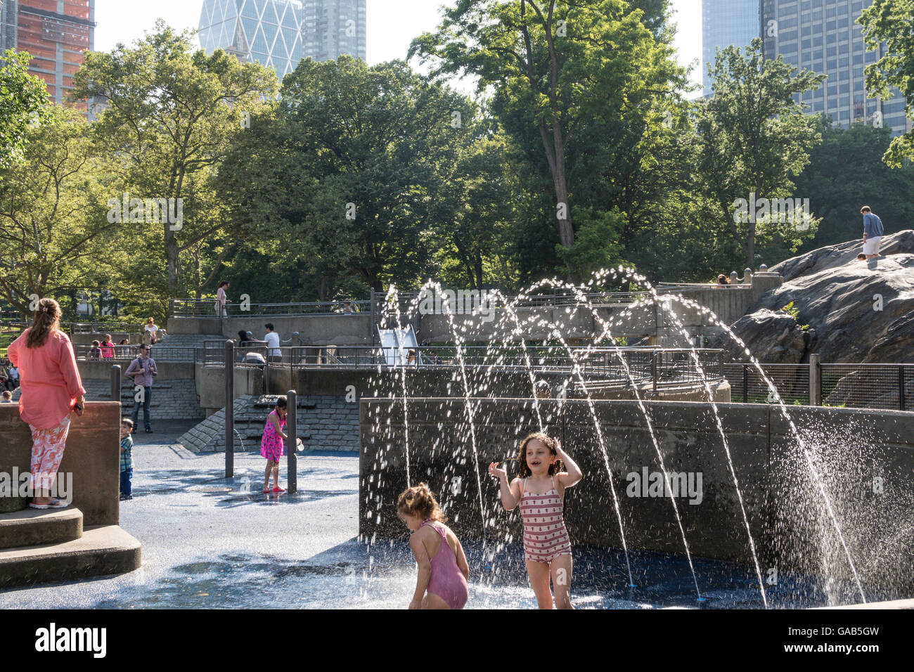 Sprinklers in Heckscher Playground, Central Park, NYC Stock Photo