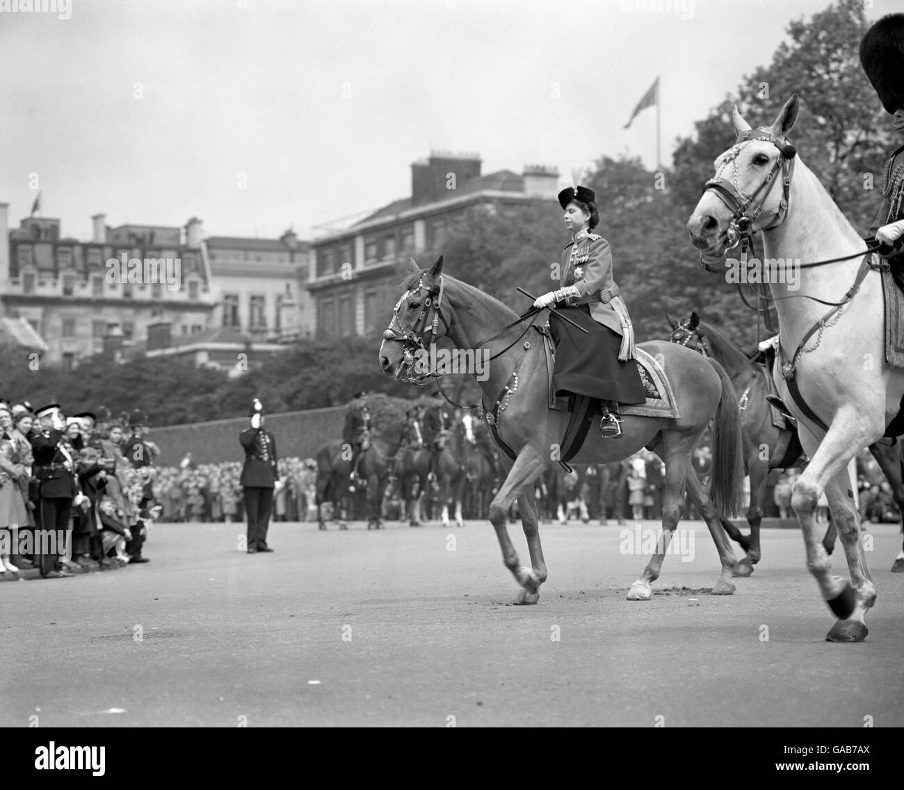 Princess Elizabeth, deputising for the King for the first time, leading the mounted procession down the Mall, back to Buckingham Palace. Stock Photo