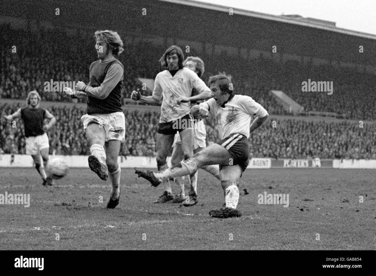 Hereford winger Eric Redrobe (light shirt) shoots the Third Division ...