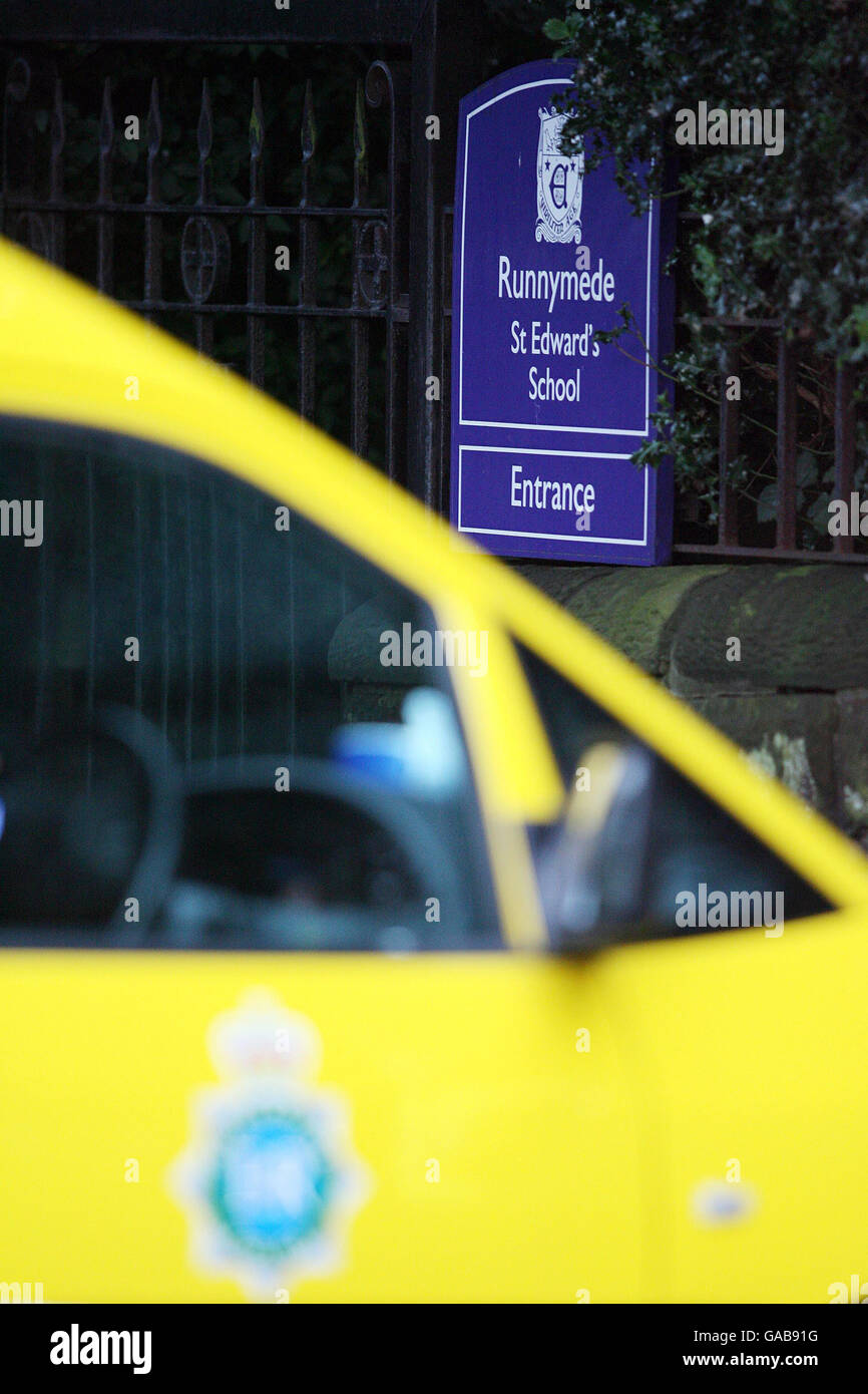 Police and forensic officers outside St Edwards College, in Sandfield