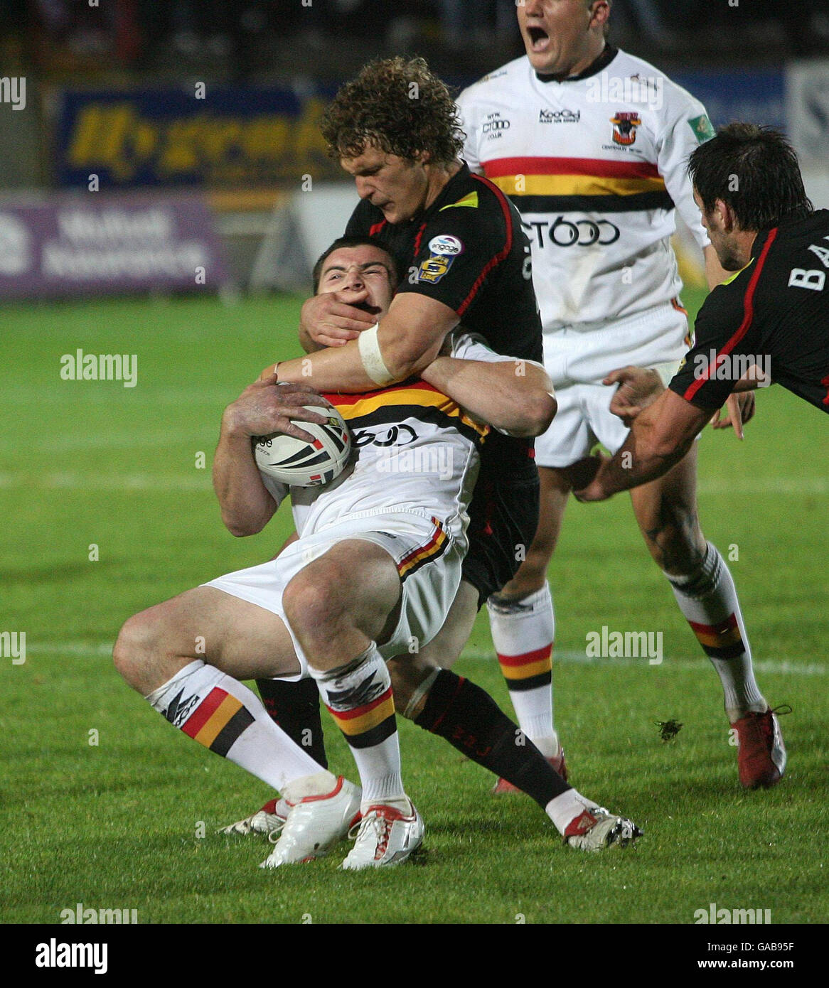 Wigan's Sean O'Loughlin catches Bradford Bulls' Iestyn Harris with a high tackle during the Engage Super League Elimination play-off match at Grattan Stadium, Odsal, Bradford. Stock Photo