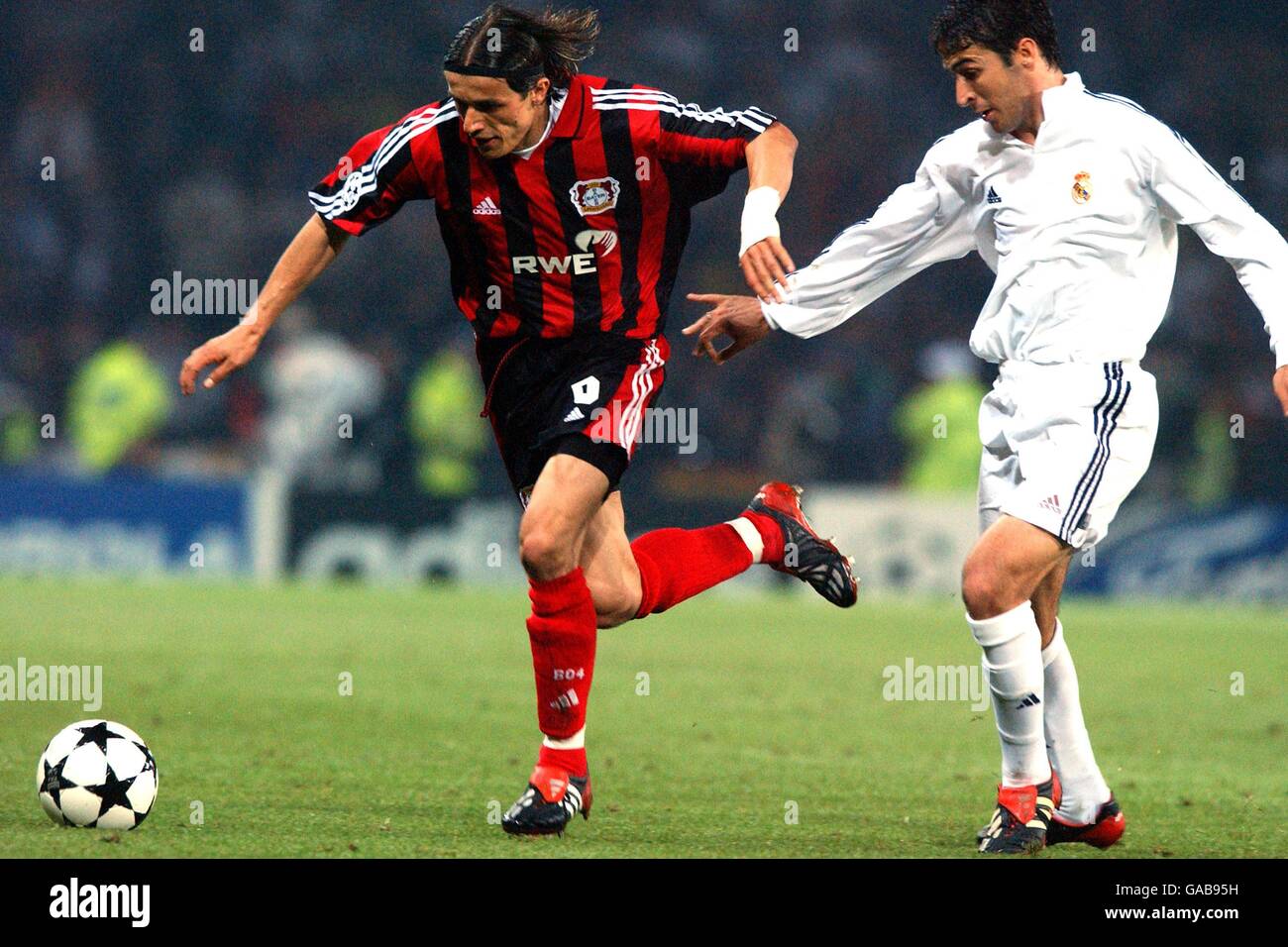 Soccer - UEFA Champions League - Final - Bayer Leverkusen v Real Madrid. Bayer  Leverkusen's Boris Zivkovic (l) goes past Real Madrid's Raul (r Stock Photo  - Alamy