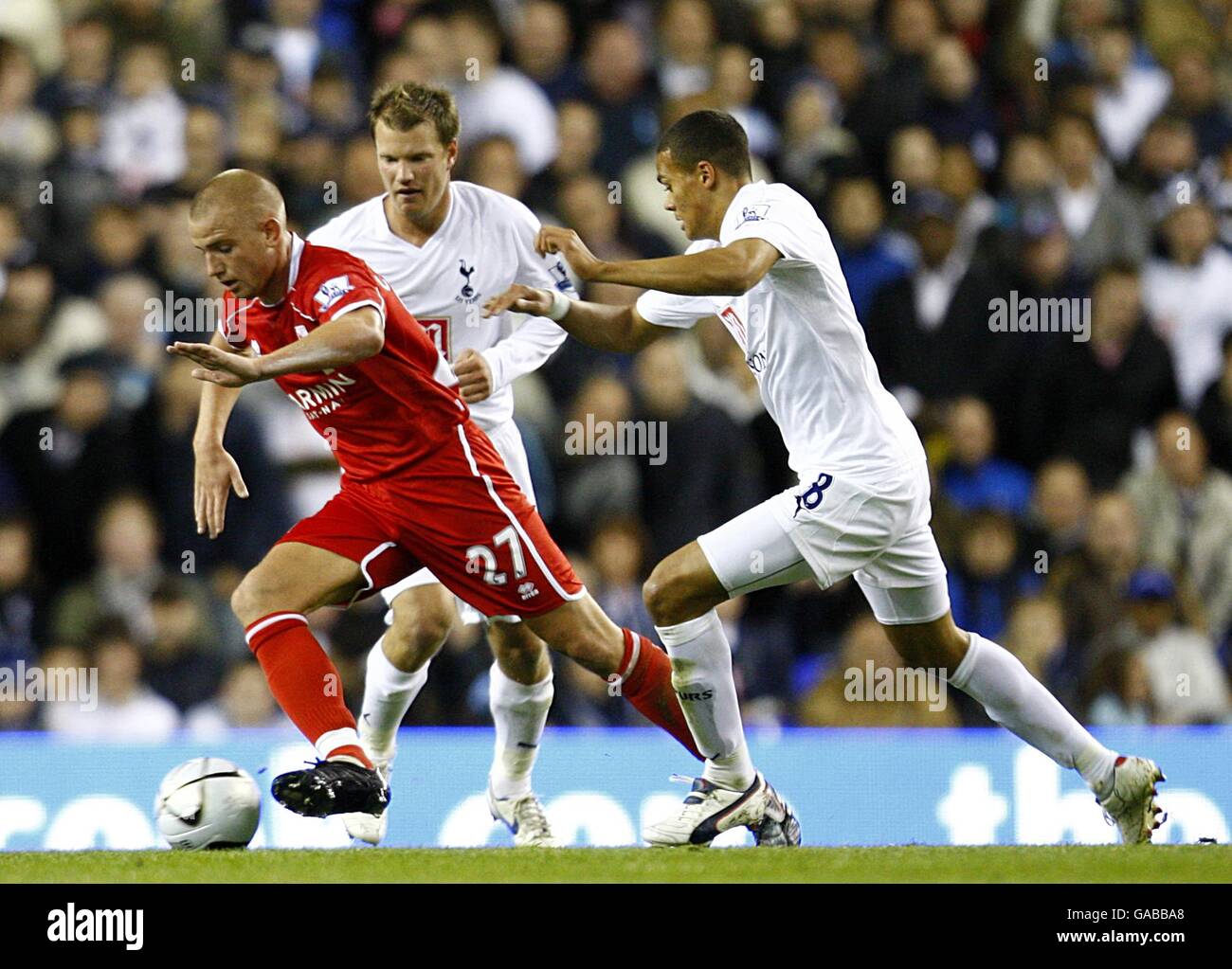Middlesbrough's Lee Cattermole moves away from , Tottenham Hotspur's Teemu Tainio and Jermaine Jenas Stock Photo